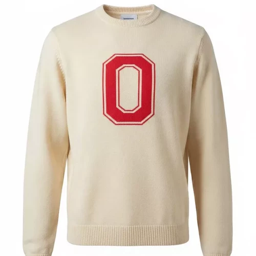 cream colored sweater with a red block o in the center chest 