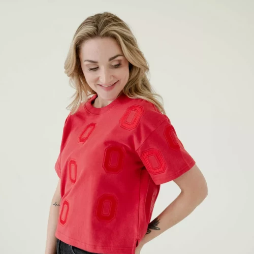 Cropped red shirt with red block O's scattered throughout the shirt