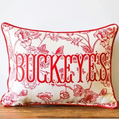 red floral patter on a white pillow and 