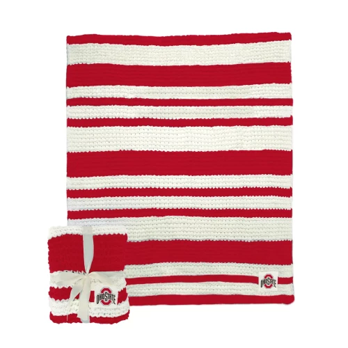 red and white cable knit throw