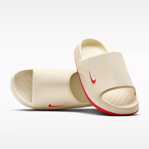 red and white nike slides with an ohio state logo on the bottom 
