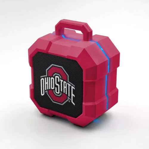 red and black bluetooth speaker on a white background 