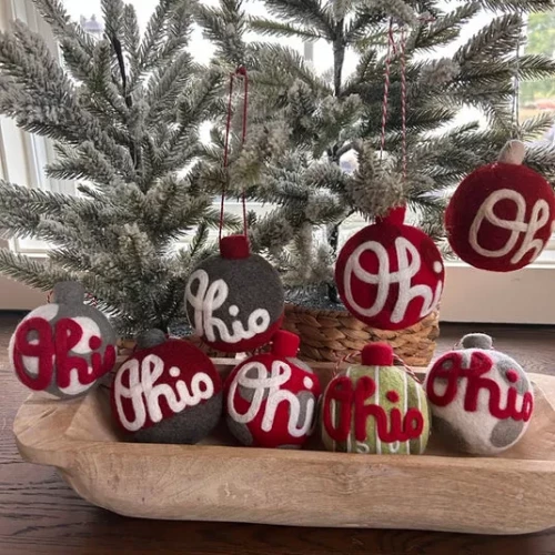 handmade wool ornaments on a holiday tree