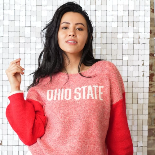 one model wears a pink and red ohio state sweater